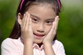 A Surprised Youthful Filipina Child