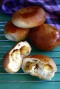 Filipino bread called Pan de Coco or bread roll filled with sweetened shredded coconut meat