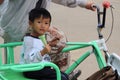 Filipino child eating ice cream Burnham park Baguio Philippines