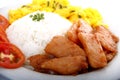 Filipino food called Chicken Tocino or cured chicken meat with rice, tomato scrambled egg on a plate Royalty Free Stock Photo