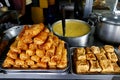 Filipino food called lumpiang toque, tokwa or fried tofu and lugaw or rice porridge at an eatery