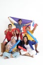 Filipino group of people holding philippines flag celebrating
