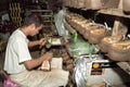 Filipino laborer working in shoe factory