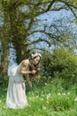 Filipino model in a rapeseed field in the springtime Royalty Free Stock Photo