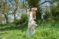 Filipino model in a rapeseed field in the springtime Royalty Free Stock Photo