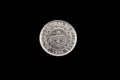 Filipino one piso coin close up on black