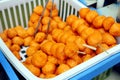 Filipino street food called Kwek Kwek or deep fried quail eggs