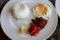 Filipino style breakfast TapSilog with rice and egg Royalty Free Stock Photo