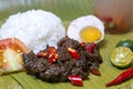 Filipino traditional authentic dish: philippine spicy beaf tapa with egg and rice