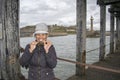 Asian Female Crabbing on Whitby West Pier Royalty Free Stock Photo