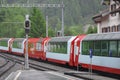 Passenger train Glacier Express from St. Moritz arrives to the platform Royalty Free Stock Photo