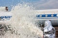 Fill the airplane with fire-fighting foam after emergency landing