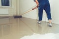 Fill screed floor repair and furnish, toned image Royalty Free Stock Photo