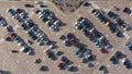 Filled car parking near mall top view on sunny day photo from height Royalty Free Stock Photo