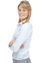 Filled with corporate confidence. Smiling young businesswoman looking positive with her arms folded while isolated on