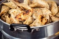 Filled fried dumplings, food market display Royalty Free Stock Photo