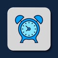 Filled outline Alarm clock icon isolated on blue background. Wake up, get up concept. Time sign. Vector