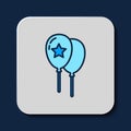 Filled outline Balloons with ribbon icon isolated on blue background. Happy Easter. Vector