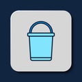 Filled outline Bucket icon isolated on blue background. Vector