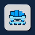 Filled outline Cargo train wagon icon isolated on blue background. Full freight car. Railroad transportation. Vector Royalty Free Stock Photo