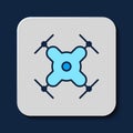 Filled outline Drone flying icon isolated on blue background. Quadrocopter with video and photo camera symbol. Vector