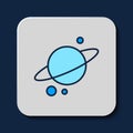 Filled outline Planet Saturn with planetary ring system icon isolated on blue background. Vector