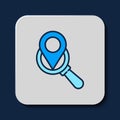 Filled outline Search location icon isolated on blue background. Magnifying glass with pointer sign. Vector