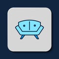 Filled outline Sofa icon isolated on blue background. Vector