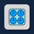 Filled outline Time zone clocks icon isolated on blue background. Vector