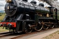 A filled tea kettle whistling into a steam locomotive