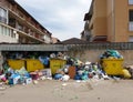 Filled trash bins in populated area in Floresti