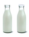 Filled unopened and opened milk bottle Royalty Free Stock Photo
