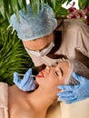 Dermal fillers of woman in spa salon with beautician. Royalty Free Stock Photo