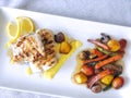 Fillet of Hake merluza with vegetables Royalty Free Stock Photo