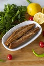 Fillet mackerel on wooden background. Seafood dishes. Royalty Free Stock Photo