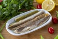 Fillet mackerel on wooden background. Seafood dishes. Royalty Free Stock Photo