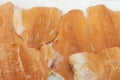 Fillet of salmon to portions close-up on ice in supermarket. Sale of seafood, fish. Open showcases , counter of seafood Royalty Free Stock Photo