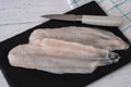 Filleted Scottish Haddock on a Carving Slate and Ready for the Oven