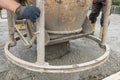 Filling base plate with fresh concrete