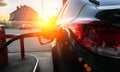 Filling car petrol. Pump gas fuel at gasoline oil station for nozzle tank. Black handle of the refueling gun. Royalty Free Stock Photo