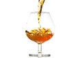 Filling a glass of brandy Royalty Free Stock Photo