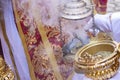 Filling one of the censers with incense in a Holy Week procession