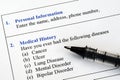 Filling the patient medical history questionnaire Royalty Free Stock Photo