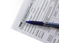 Filling in tax form 1040 Royalty Free Stock Photo