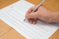 Filling test score sheet Royalty Free Stock Photo