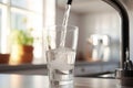 Filling up a glass with clean drinking water from kitchen faucet. Safe to drink tap water Royalty Free Stock Photo