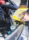 Filling Up Windshield Washer Fluid in a Car