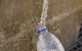 Filling water bottle Royalty Free Stock Photo