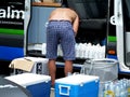 Filling the water bottles for the bicycle race Royalty Free Stock Photo