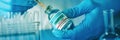 Fills a syringe with monkeypox vaccine, web banner